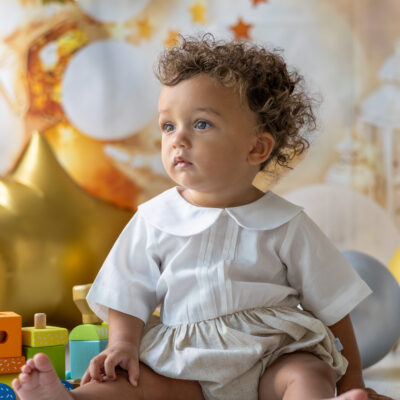 mace and co kids clothing dubai, romper with cotton shirt and linen bottoms in a sand beige colour, outfit for boys infant age to toddler. Perfect for special occasions, birthday parties, formal events and playtime.