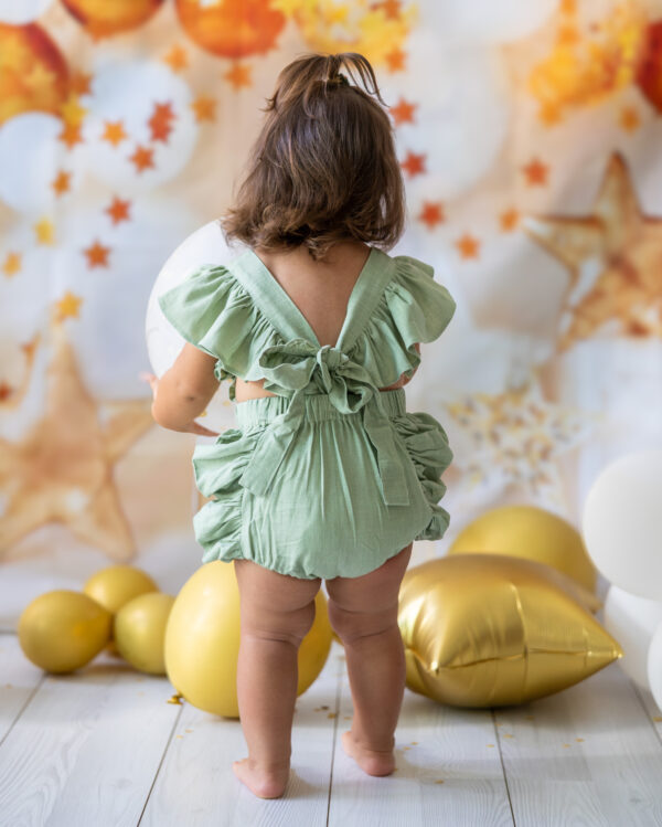 mace and co kids clothing dubai, romper with bow back in mint green colour, linen fabric material, for girls ages infant, toddler up to seven years old, perfect for birthday parties, special occasions and formal wear.