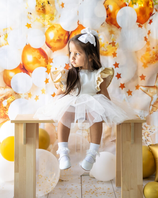 mace and co kids clothing Dubai, white and gold color tulle dress, for girls from infant, toddler. Perfect for birthday parties, special occasions and formal events.